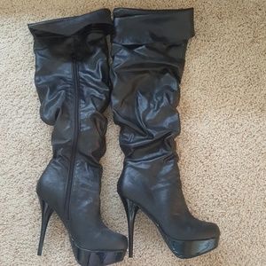 Over the knee high heel boots